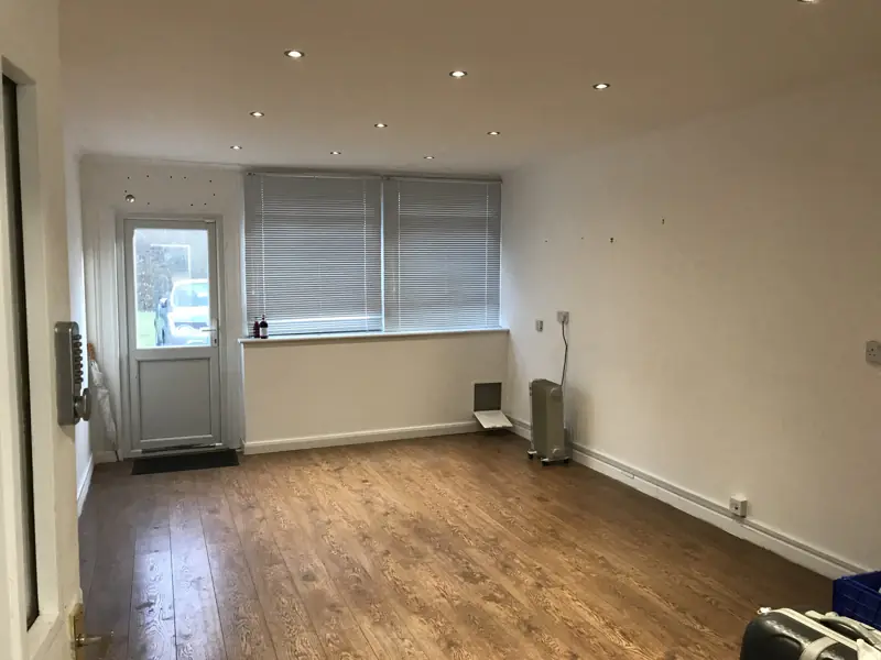 Bright room with wood floor and window