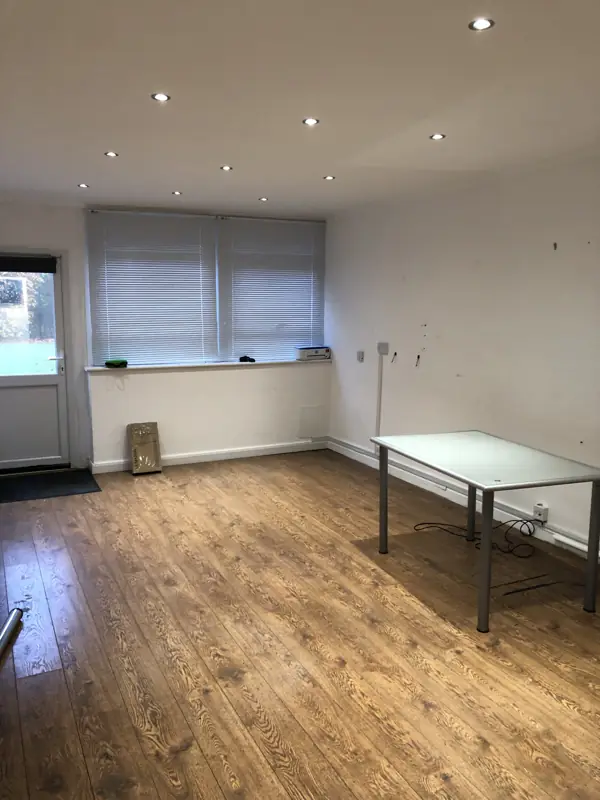 Room with desk by the window